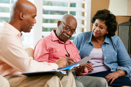 couple meeting with estate planning attorney