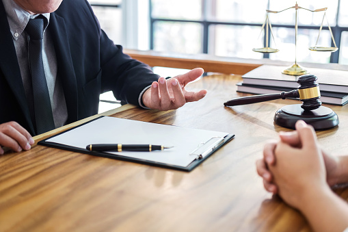 Business talking with client at table