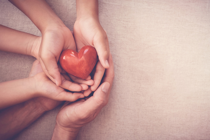 hands holding heart estate md